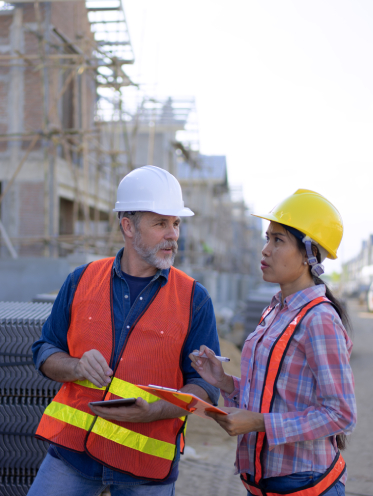 construction company in Sacramento CA discussing residential construction project on site